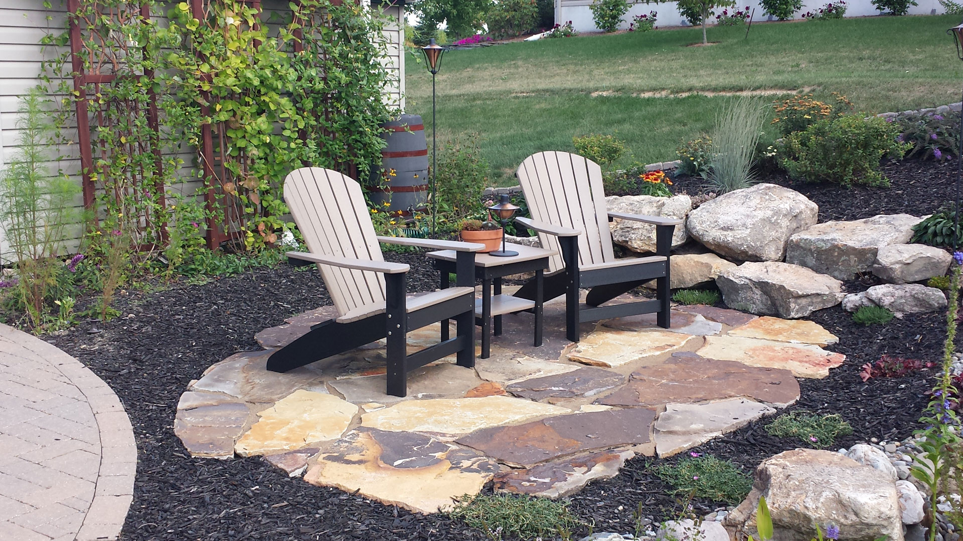 Natural flagstone seating area with chairs
